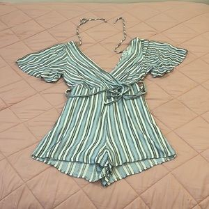 Women’s vertically striped romper. Tie at waist and behind neck. V-back&V-front.